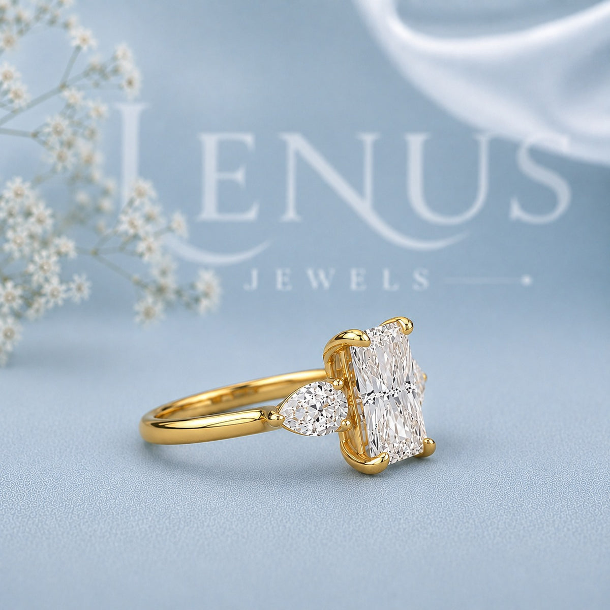 Radiant Three-Stone Moissanite Ring – Gold Pear Side Engagement Ring