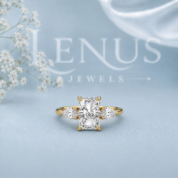 Radiant Three-Stone Moissanite Ring – Gold Pear Side Engagement Ring