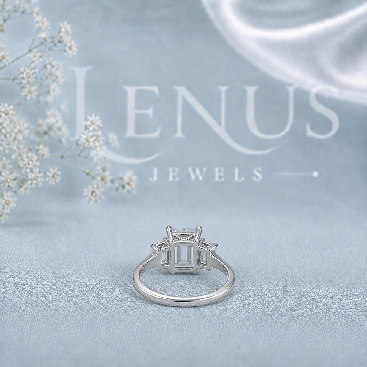 Emerald-Cut Moissanite Three-Stone Engagement Ring with Baguette Side Stones