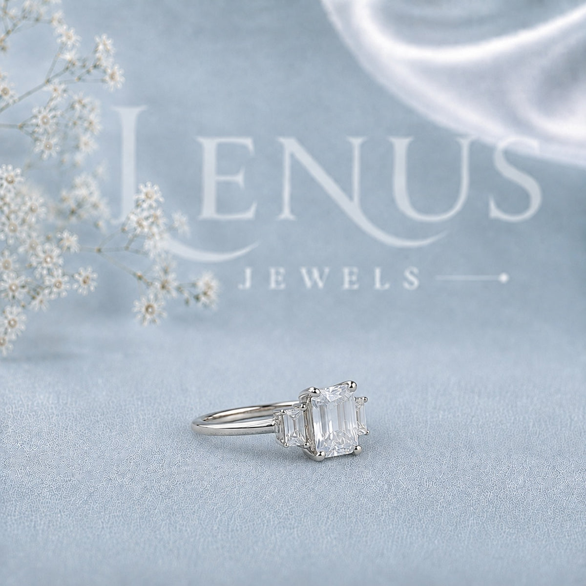 Emerald-Cut Moissanite Three-Stone Engagement Ring with Baguette Side Stones