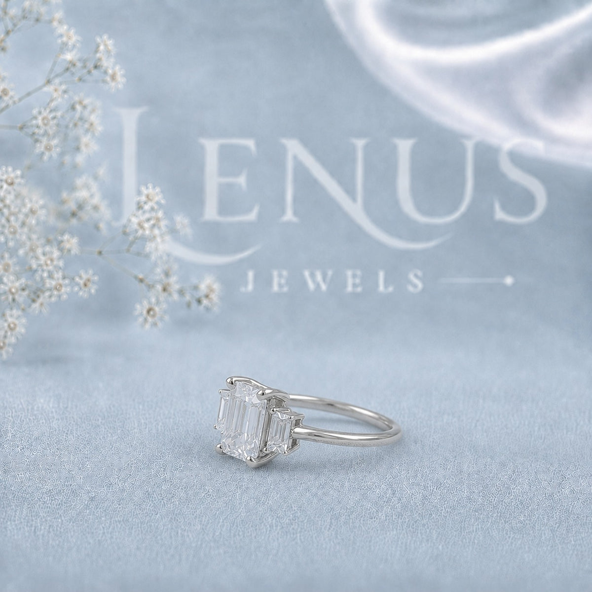 Emerald-Cut Moissanite Three-Stone Engagement Ring with Baguette Side Stones