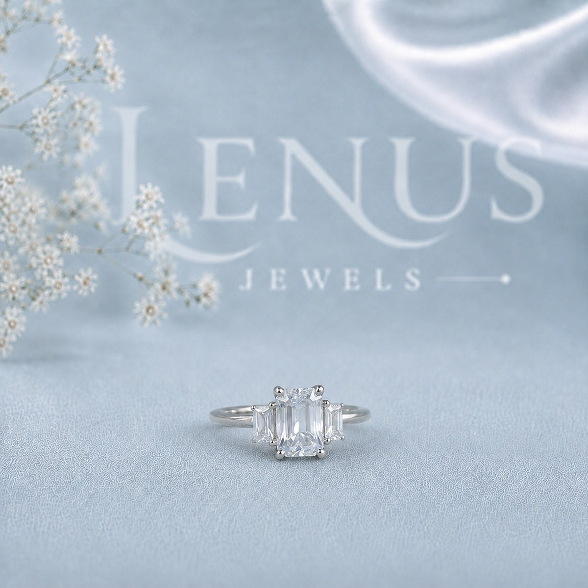 Emerald-Cut Moissanite Three-Stone Engagement Ring with Baguette Side Stones